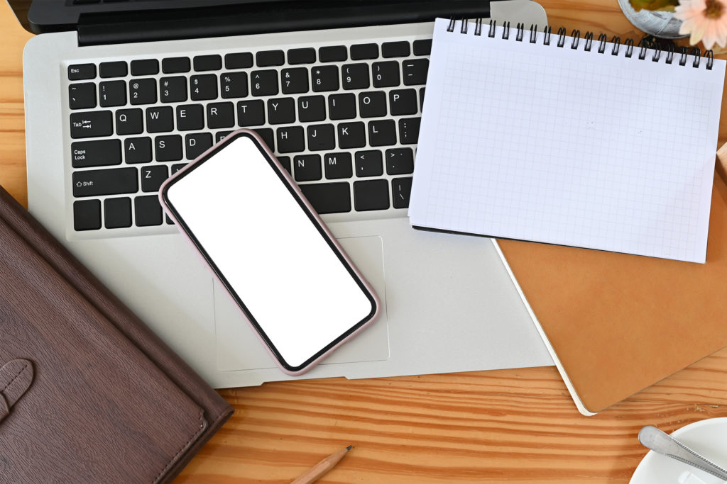 a laptop and a tablet on a table