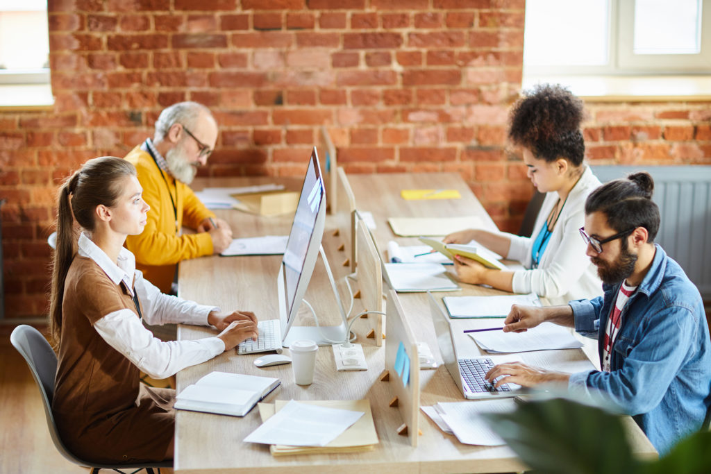 a group of people sitting around a table